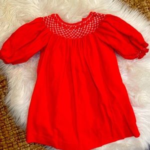 Red corduroy dress with bubble sleeves smocked top with small pearls